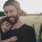 lifestyle image of a man holding a child outdoors in the sun
