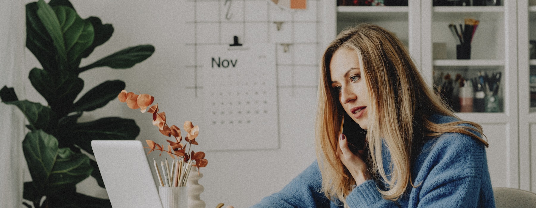 lifestyle image of a young women working on a laptop